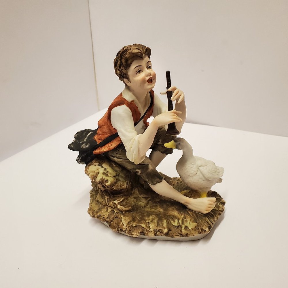 Lefton ceramic figurine Boy playing flute goose